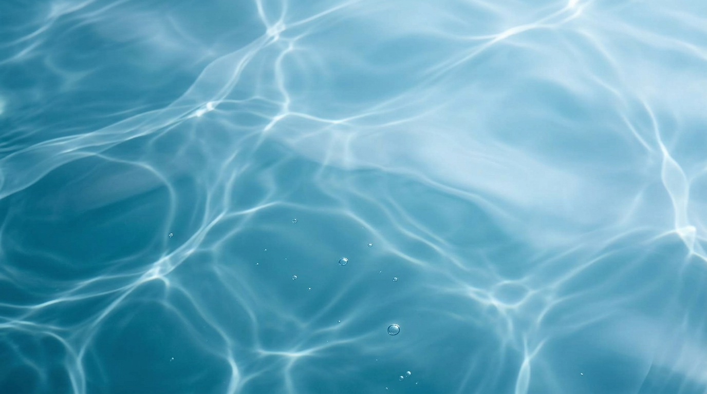 Soft blue water surface with light caustics